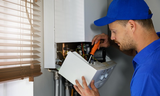gas boiler being serviced