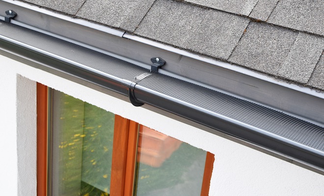 grey plastic gutters on roof