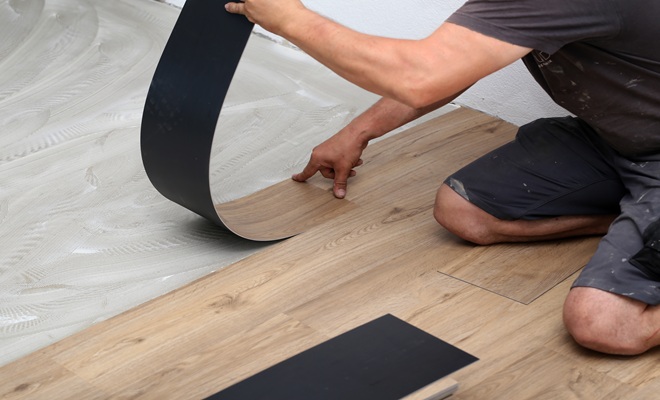 Person laying LVT