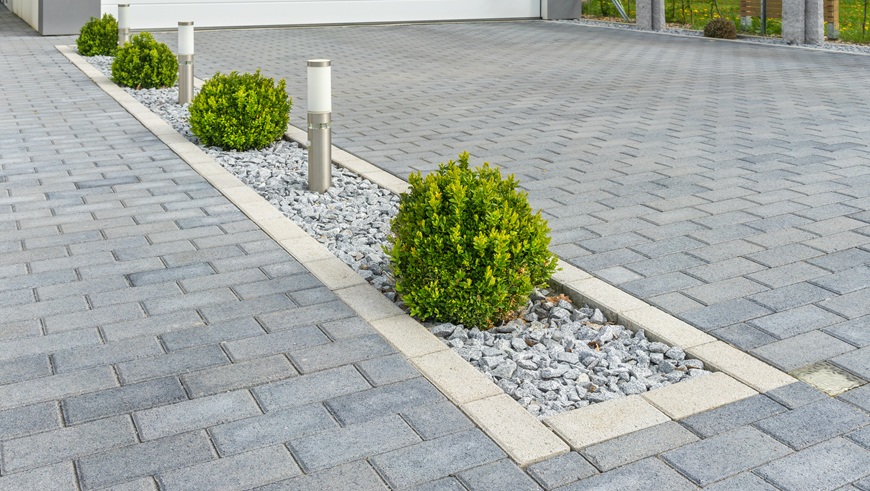 Block paving driveway with trees