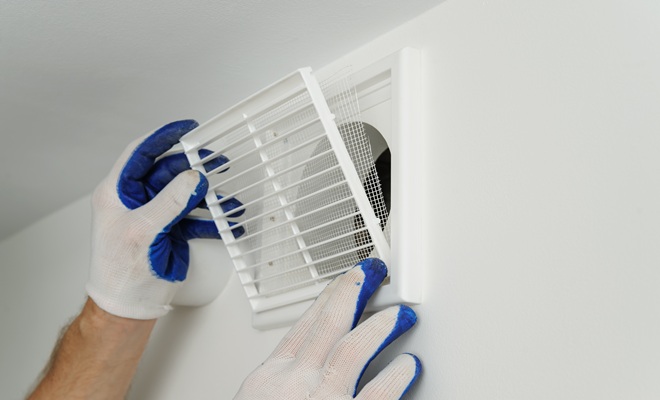 Bathroom vent being installed