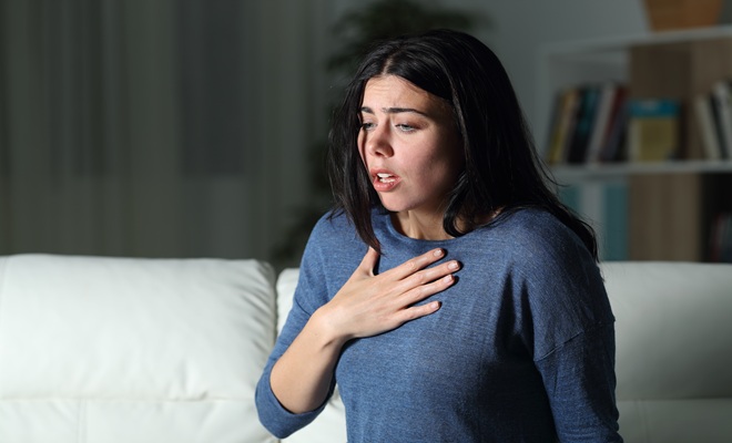 Woman trouble breathing