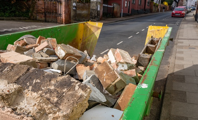 Skip with rubble in it