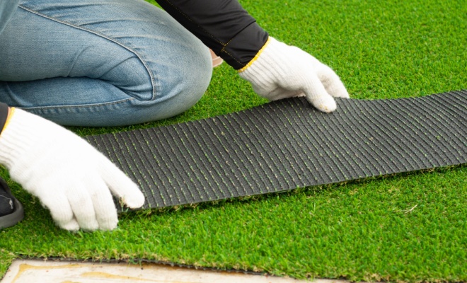 artificial grass with close up of underside of grass strip