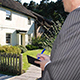 person inspecting house