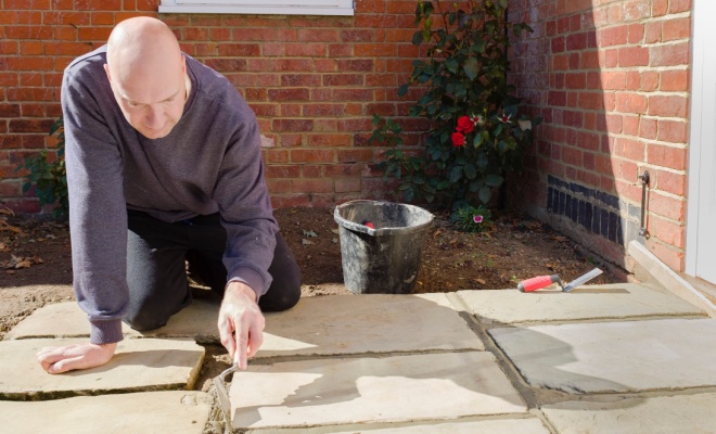 Man installing patio