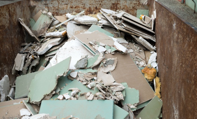 Plaster in a skip