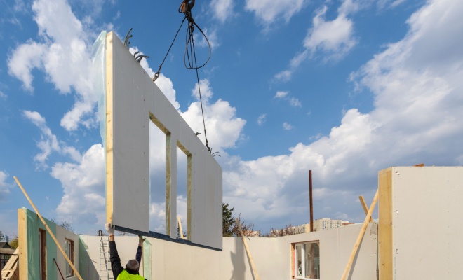 prefab being guided on site