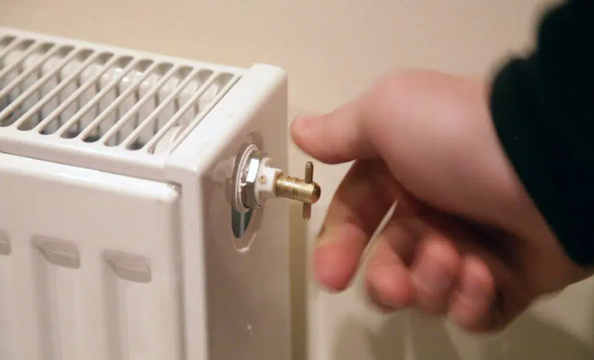 Hand turning valve on the side of the radiator
