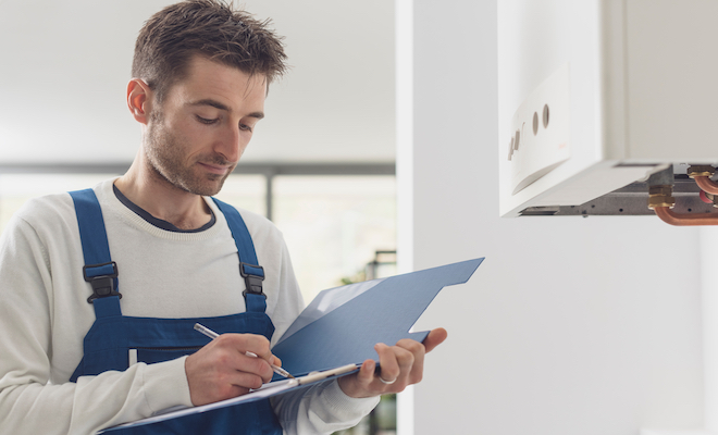 man making notes