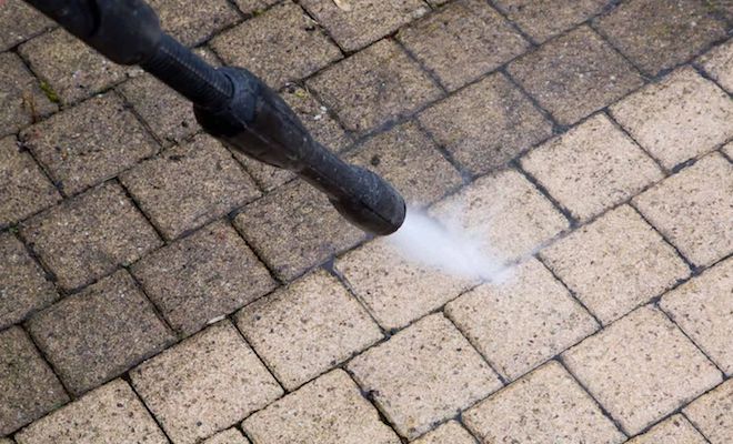 Pressure washing a patio