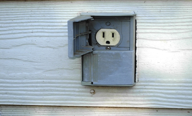 Outside socket on white wood