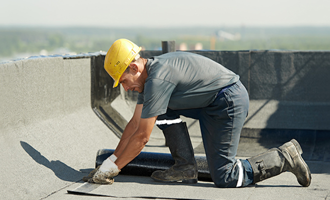 Roofer working on a roof