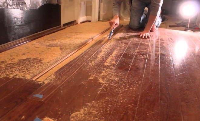 Floorboards being planed