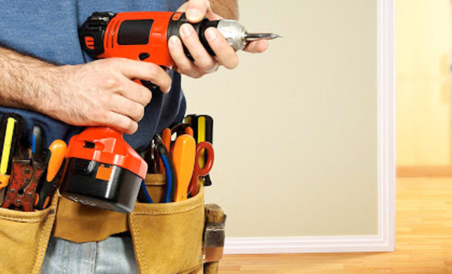 Handyman holding a drill