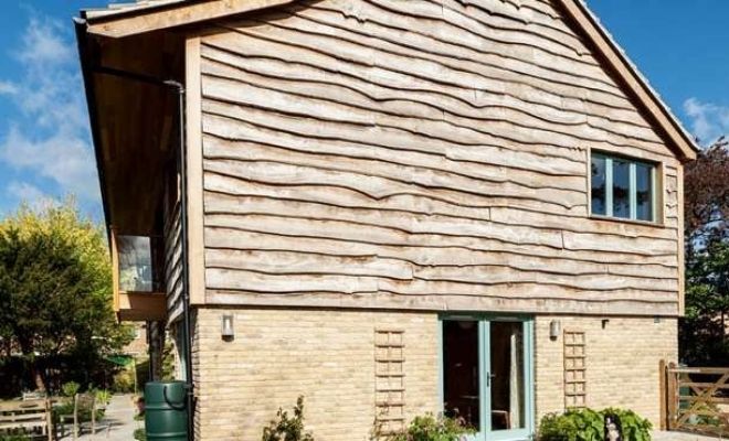 Timber waney lap cladding