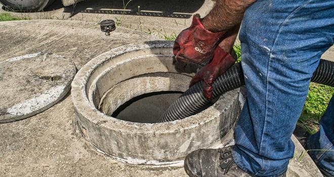 Cleaning septic tanks