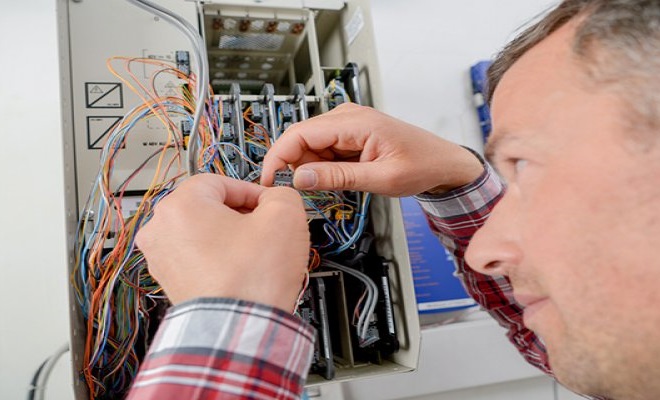 electrician working with wires