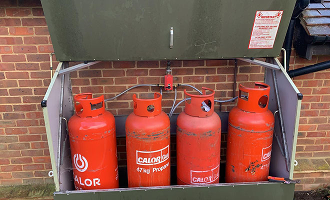 four cylinders in a safe box