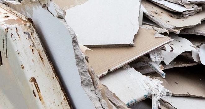 Plaster in a skip