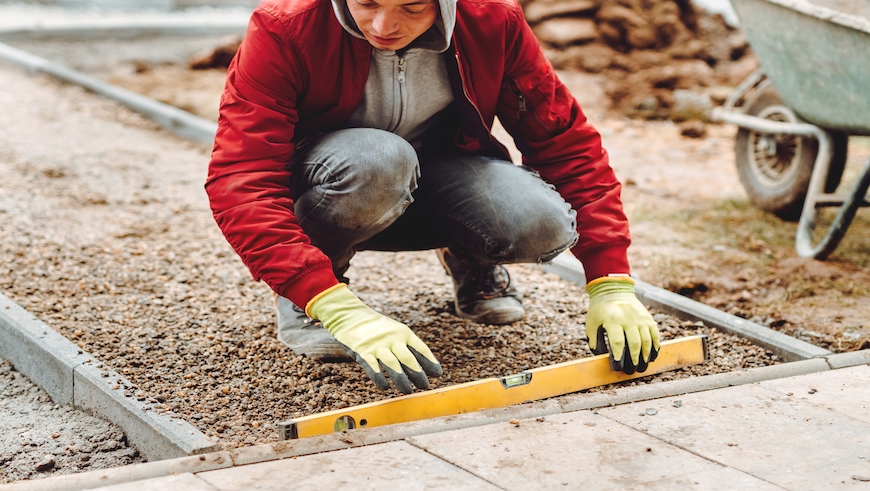 someone installing driveway