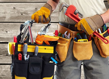 handyman holding tools