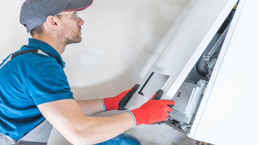 person opening a boiler